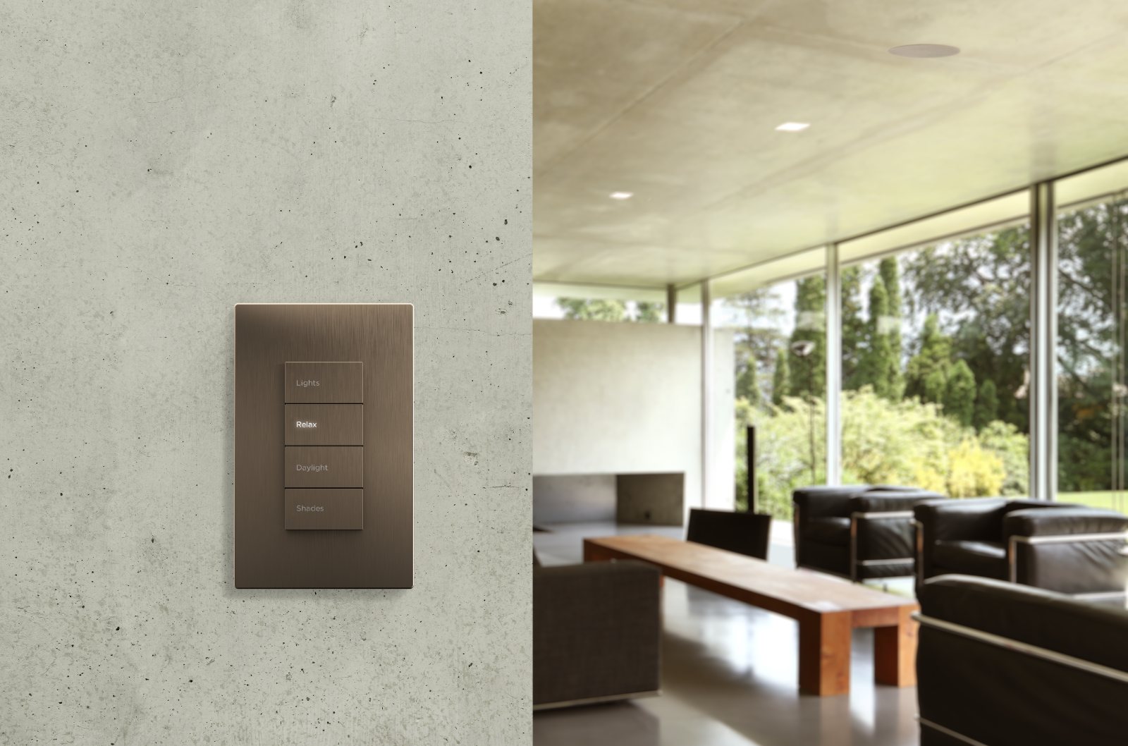 Savant Ascend four-button keypad in bronze finish on a concrete wall